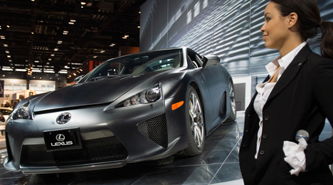 woman with Lexus LFA