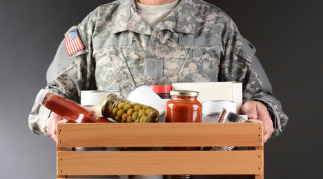 soldier with food donations