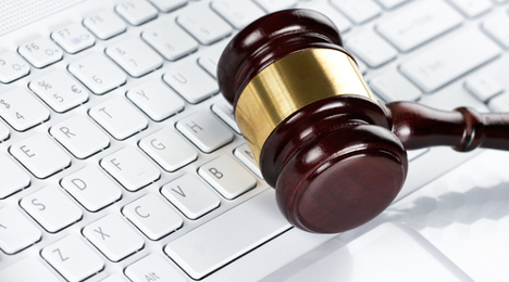 online auction gavel on keyboard