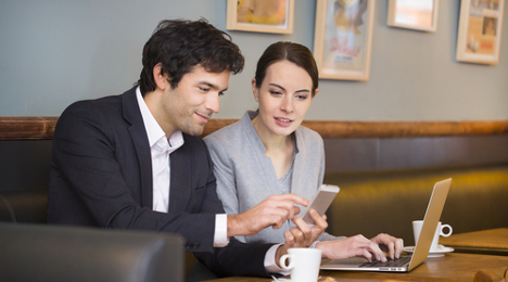 business man and woman having coffee