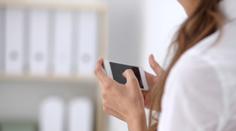 businesswoman using smartphone