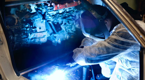 mechanic working on car